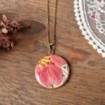 Collier doré fleur rouge Elisabeth